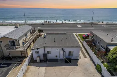 an aerial view of a parking lot and the ocean at Carlsbad Blvd Villa in Carlsbad