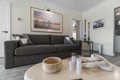 a living room with a couch and a table at Carlsbad Blvd Villa in Carlsbad