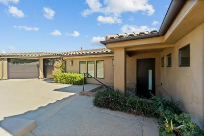 a house with a driveway and a garage at Dana Point Luxe in Dana Point