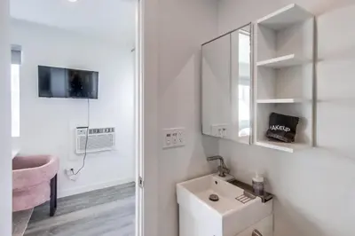 a bathroom with a sink and a mirror at Studio Verde- Free Parking, Central in San Diego