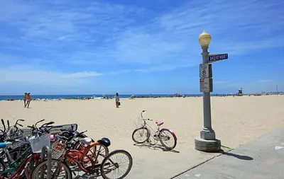 a group of bikes parked on the beach at 124 Thirty Fourth Street B in Newport Beach