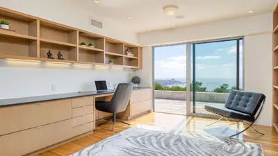 an office with a desk and two chairs and a window at Jewel by AvantStay Panoramic Ocean Views in La Jolla in San Diego