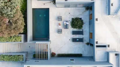 an overhead view of a building with a blue door at Jewel by AvantStay Panoramic Ocean Views in La Jolla in San Diego