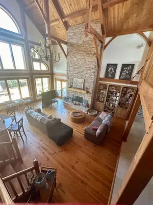an overhead view of a living room with a stone fireplace at Sunset-Ridge in Alpine