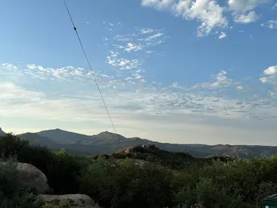 a view of a hill with mountains in the background at Sunset-Ridge in Alpine
