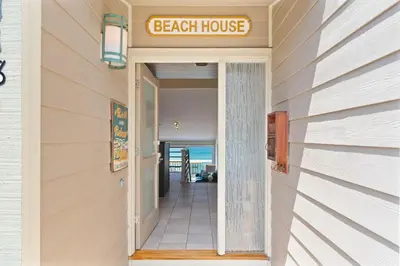 a beach house entrance with a beach house sign at Picturesque Perfection in Leucadia in Encinitas