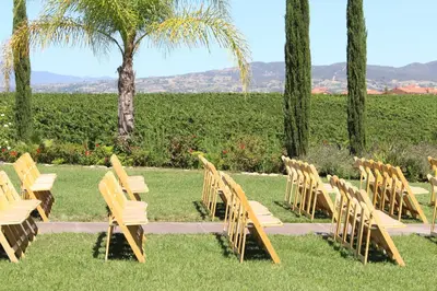 a group of chairs sitting in the grass at Carter Estate Winery and Resort in Temecula