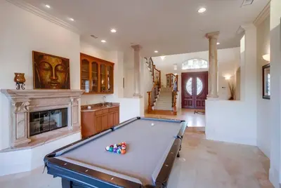 a pool table in a room with a fireplace at Villa Andalusia 6BR 5BA Luxury Jacuzzi Views and Games in Escondido