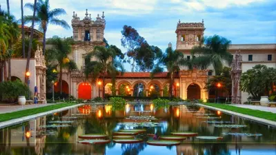 an old building with a pond in front of it at Ultimate Getaway: Spa Game Rooms Firepit Views in San Diego
