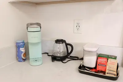a kitchen counter with a coffee maker and a blender at Pristine Poway Retreat in Poway