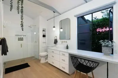 a bathroom with a sink and a toilet and a shower at Quaint Studio for 2 in the Heart of Little Italy in San Diego