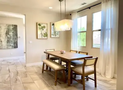 a dining room with a wooden table and chairs at Irvine Luxury 2Bedroom 2Bathroom Portola Springs in East Irvine