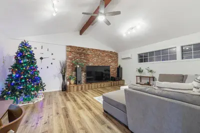a living room with a christmas tree and a couch at Spacious Family Retreat in the heart of San Diego in San Diego