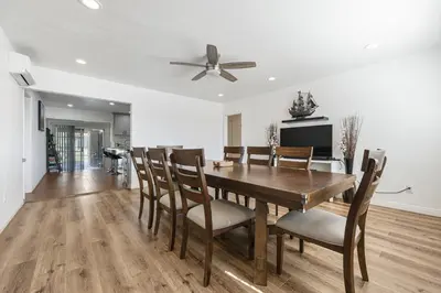 a dining room with a wooden table and chairs at Spacious Family Retreat in the heart of San Diego in San Diego