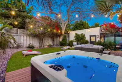 a backyard with a hot tub in the yard at Spectacular Seaview Oasis -Views Spa Game Room in San Diego