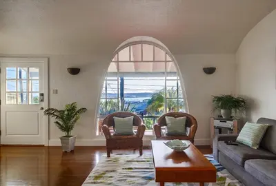 a living room with a couch and chairs and a large window at Spectacular Seaview Oasis -Views Spa Game Room in San Diego