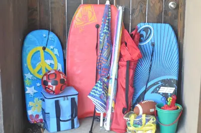 a group of surfboards leaned up against a wall at Spectacular Seaview Oasis -Views Spa Game Room in San Diego