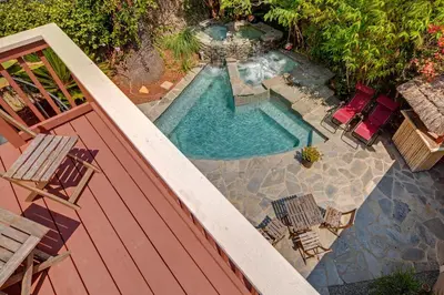 an overhead view of a swimming pool on a deck at Pool Room - Entire Guest Suite - Private Entrance in San Diego