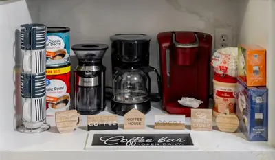 a kitchen counter with a coffee maker and other items at Entire Private Home with 3 Bedrooms 3 Bathrooms, Balcony Views, 10-mins to San Diego Gaslamp, Downtown, Available Now in National City