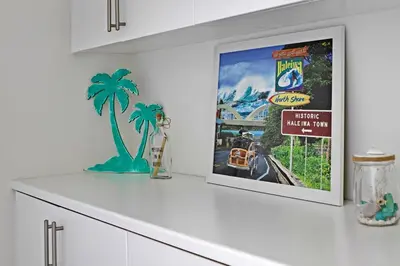 a kitchen counter with a tv on a wall at Fun In The Sun 2 Bed 2 Bath Home in Oceanside