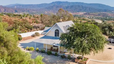 an aerial view of a church with mountains in the background at Wine Country Retreat Gorgeous Views Minutes to Wineries in Temecula