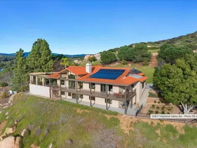 an aerial view of a house with a solar roof at Breathtaking Retreat in Escondido