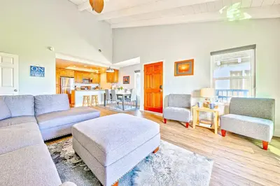 a living room with a couch and chairs and a table at Condo in Newport Beach with Private Balcony and Ideal Location by the Pier in Newport Beach