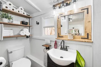 a bathroom with a sink and a toilet and a mirror at Julian Cafe Cottages With Breakfast At The Julian Cafe in Julian