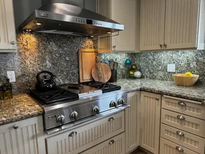 a kitchen with a stainless steel stove top oven at Secluded Paradise Oasis with Gorgeous Pool in El Cajon