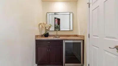 a bathroom with a sink and a mirror at Chardonnay Charm by AvantStay Luxe Group Retreat w Pool Mins to Wineries in Country Road Estates