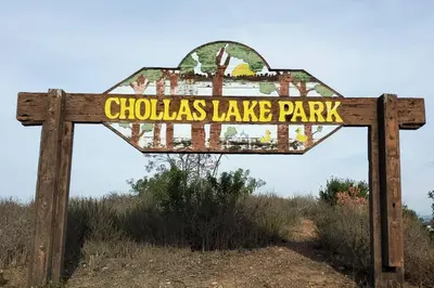 a sign for a cholislake lake park at SanDiego Insider's Coastal Bliss and Urban Wonders in San Diego