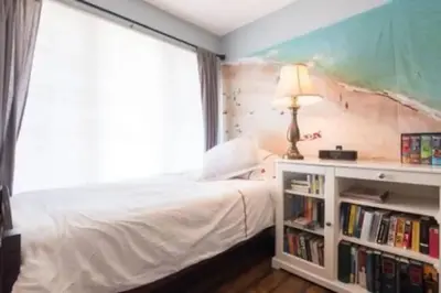 a bedroom with a bed and a book shelf at Luxurious Family 5 Bedroom Getaway in San Diego