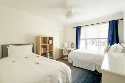 a bedroom with two beds and a window at Luxurious Family 5 Bedroom Getaway in San Diego