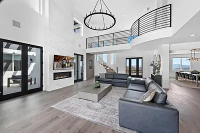a living room with a couch and a fireplace at Vaquero by Fieldtrip Modern Wine Country Resort in Temecula