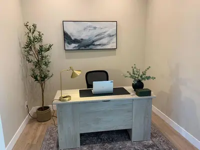 a desk with a laptop on it in a room at New Constructed Home in Poway in Poway
