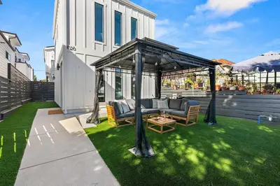 a gazebo on a lawn in a backyard at Brand New Coastal Contemporary in Pacific Beach in San Diego