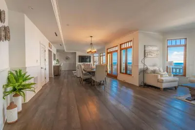 a large living room with a table and chairs at Spectacular La Jolla Cove Compound in San Diego