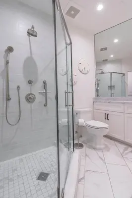 a bathroom with a shower and a toilet at Spectacular La Jolla Cove Compound in San Diego