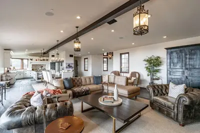 a large living room with couches and a table at Spanish Dream with Ocean Views in Encinitas