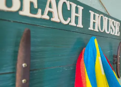 a close up of a boat with a sign on it at Sandy Toes in San Diego