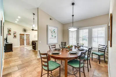 a dining room with a table and chairs at 13 Mi to Downtown San Diego Quiet Home with Spa! in Chula Vista