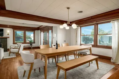 a dining room with a table and chairs at Falcon Chic Escape - Hot Tub - Modern - Proximity in San Diego
