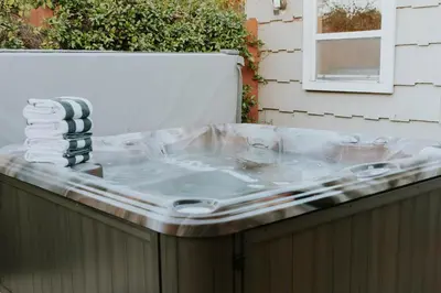 a hot tub in the backyard of a house at Family-Friendly Bay Views, Game Room, Hot Tub! in San Diego