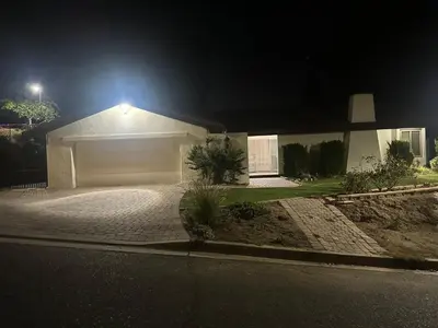 a house with a white garage at night at Mount Helix Villa in El Cajon
