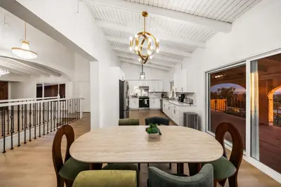 a dining room with a table and chairs at # Marbella Lane - Home with Ocean & Golf Course Views in San Clemente