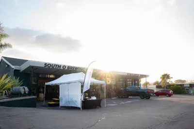 a tent in front of a building with a truck at Steps to Beach & Close to Restaurants and Shops in Oceanside