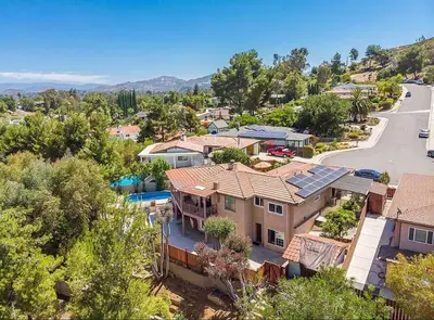 an aerial view of a house with a road at Majestic 5BR Villa with Guesthouse, Pool & Spa in Poway