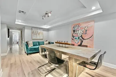 a living room with a table and a couch at MB Contemporary 14 Guests by Sand AC plus Garage in San Diego