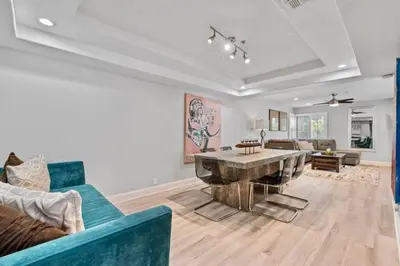 a living room with a couch and a table at MB Contemporary 14 Guests by Sand AC plus Garage in San Diego