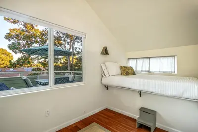a bedroom with a bed and a window at Encinitas Paradise | Seabluffe Gated Community w/ Beach Access in Encinitas